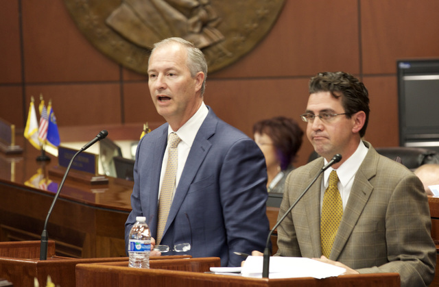 Steve Hill, chairman of the Southern Nevada Tourism and Infrastructure Committee, and Jeremy Aguero of Applied Analysis speak to the State Senate about the stadium proposal in Carson City on Tuesd ...