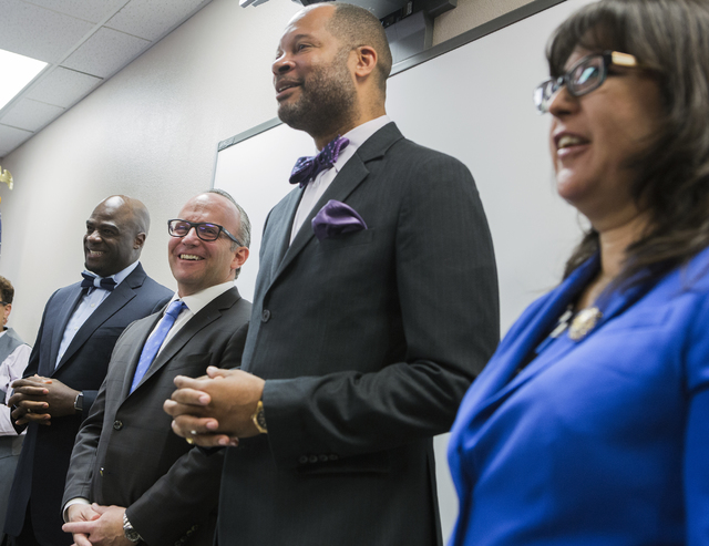 Sen. Aaron Ford, second from right,  speaks during a news conference discussing benefits for employment at the stadium project, Thursday, Oct. 27, 2016, at the Urban Chamber of Commerce in North L ...