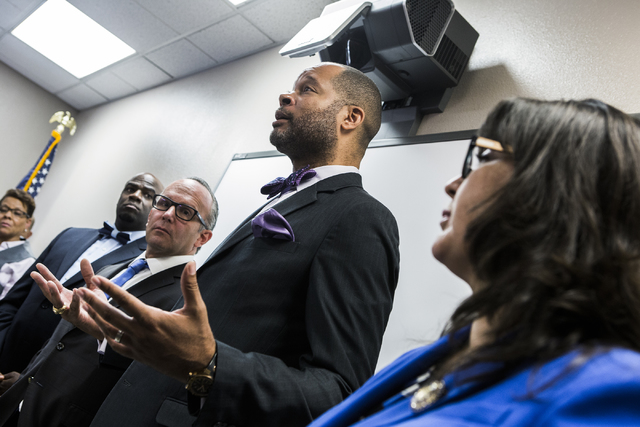 Sen. Aaron Ford, second from left,  speaks during a news conference discussing benefits for employment at the stadium project, Thursday, Oct. 27, 2016, at the Urban Chamber of Commerce in North La ...