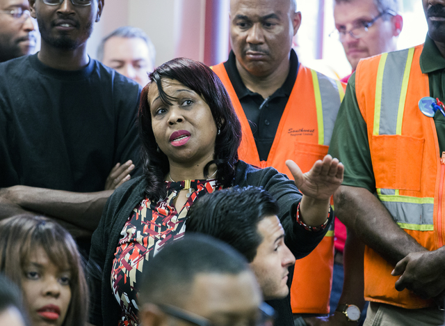 Sheila Collins asks about community benefits in the 89106 zip code during a news conference discussing benefits for employment at the stadium project at the Urban Chamber of Commerce in North Las  ...