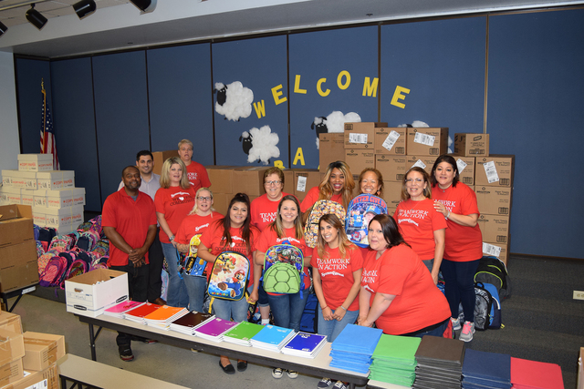 Station Casinos employees smile during a Sept. 1, 2016, Smart Start school supplies donation at Whitney Elementary School. Special to View