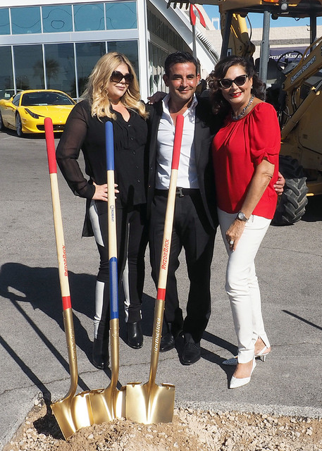 Jesika Towbin-Mansour, her husband, Rony Mansour, and Carolynn Towbin, left to right, pose at the new Towbin Ferrari/Masarati dealership on Sahara Avenue in Las Vegas, Tuesday, Oct. 18, 2016. (Jer ...