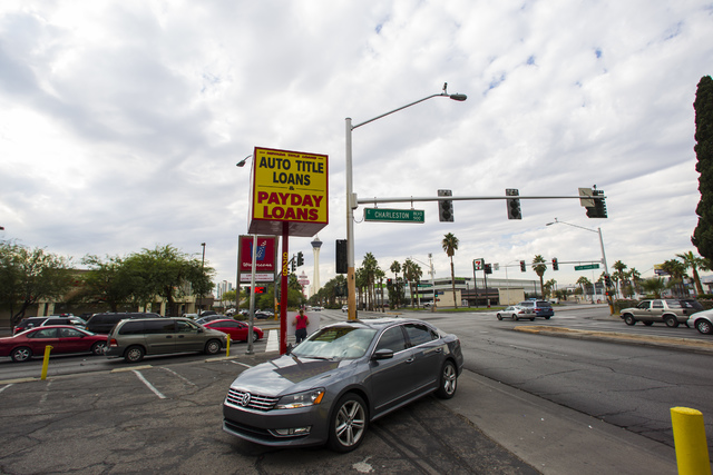 A car drives into the lot for Nevada Title Loans off Las Vegas and Charleston boulevards in downtown Las Vegas on Friday, Oct. 28, 2016. Chase Stevens/Las Vegas Review-Journal Follow @csstevensphoto