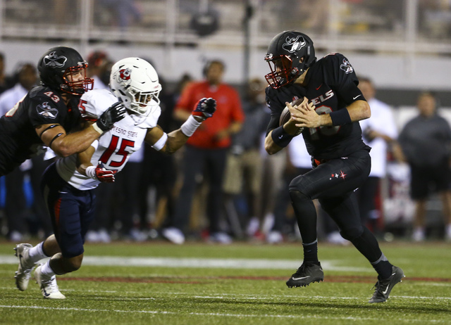 Fresno State defensive back Stratton Brown (15) chases after UNLV quarterback Dalton Sneed (18) during a football game at Sam Boyd Stadium in Las Vegas on Saturday, Oct. 1, 2016. Chase Stevens/Las ...
