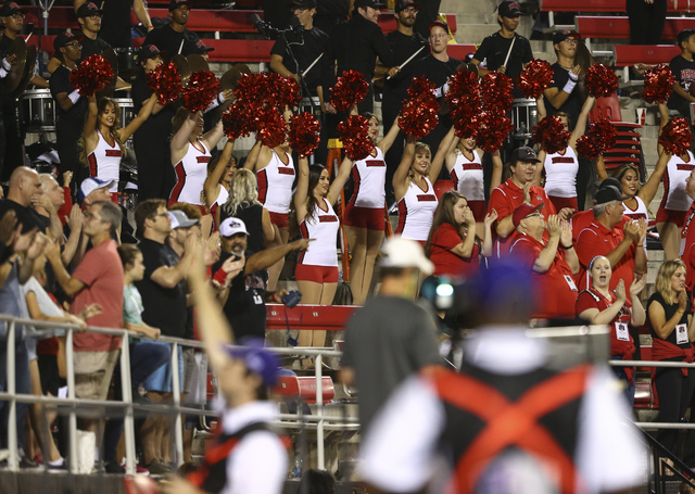 Cheerleaders react after a touchdown by UNLV quarterback Dalton Sneed (18) against Fresno State during a football game at Sam Boyd Stadium in Las Vegas on Saturday, Oct. 1, 2016. Chase Stevens/Las ...