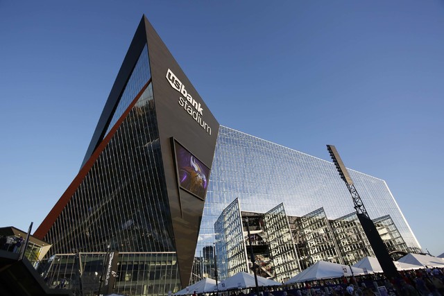 Fans arrive at U.S. Bank Stadium before an NFL football game between the Minnesota Vikings and the New York Giants Monday, Oct. 3, 2016, in Minneapolis. (AP Photo/Andy Clayton-King)