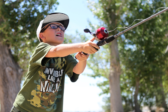 Brody Brennan, 8, throws his fishing line at Tule Springs in Las Vegas Sunday, June 7, 2015. (Erik Verduzco/Las Vegas Review-Journal) Follow Erik Verduzco on Twitter @Erik_Verduzco