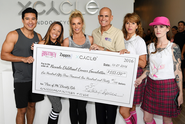 Check presentation to NCCF with Mario Lopez, Jen Barnet, Britney Spears, Jeff Gordon, Stephanie Parker and Anna Laufenburger. (Denise Truscello)