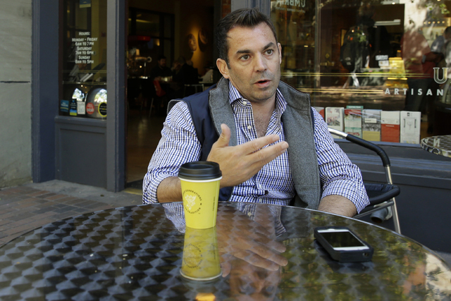 Chris Hansen, the investor attempting to build a new NBA basketball and NHL hockey arena in Seattle, takes part in an Associated Press interview, Tuesday, May 26, 2015, at a cafe in Seattle not fa ...