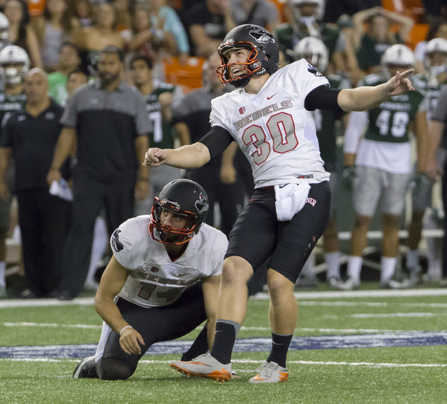 UNLV place kicker Evan Pantels (30) watches his go-ahead field goal split the uprights late in the fourth quarter of an NCAA college football game against Hawaii, Saturday, Oct. 15, 2016, in Honol ...