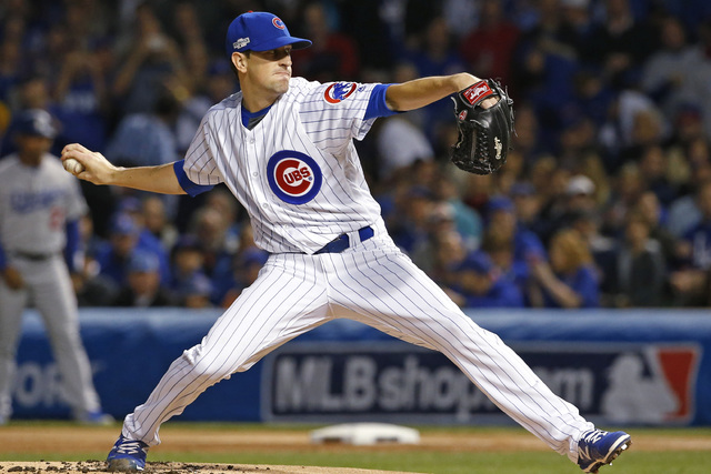 Chicago Cubs starting pitcher Kyle Hendricks (28) throws during the first inning of Game 6 of the National League baseball championship series against the Los Angeles Dodgers, Saturday, Oct. 22, 2 ...