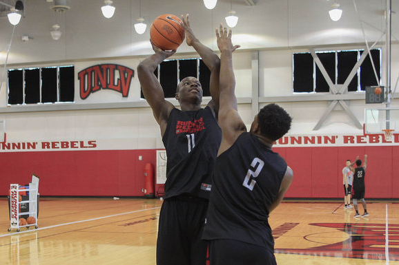 UNLV's Cheickna Dembele (11) shoots over Uche Ofoegbu (2) during team practice at the Mendenhall Center at UNLV in Las Vegas on Monday, Aug. 8, 2016. (Richard Brian/Las Vegas Review-Journal) Follo ...