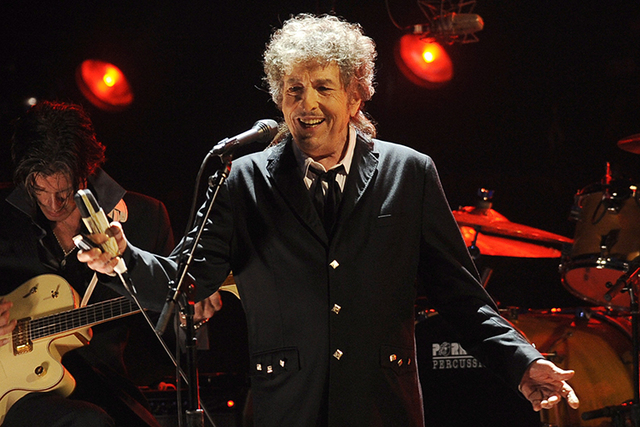 In this Jan. 12, 2012, file photo, Bob Dylan performs in Los Angeles. Dylan was named the winner of the 2016 Nobel Prize in literature Thursday, Oct. 13, 2016, in a stunning announcement that for  ...