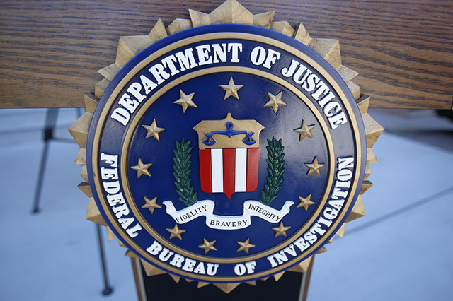 An FBI podium is shown during a press conference outside the main entrance of City Hall in Boulder City, Nevada on Friday, Sept. 16, 2016. (Richard Brian/Las Vegas Review-Journal)