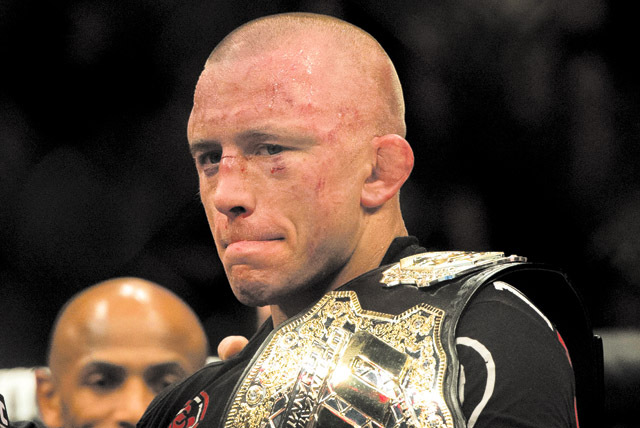 Welterweight champ Georges St-Pierre, shown a year ago in Montreal, says he will be ready for all aspects of Johny Hendricks’ game, not just his power. (The Canadian Press, Ryan Remiorz/AP)