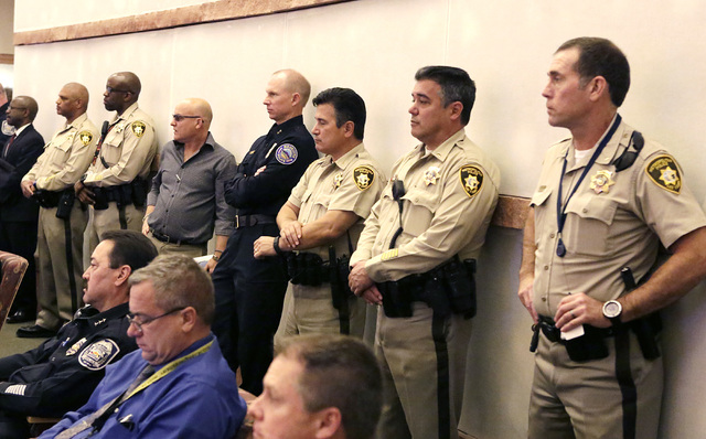 Metro police officers attend a Clark County Commission meeting, Tuesday, Nov. 15, 2016. Commissioners approved raising the county's sales tax next year to fund the hiring of more officers. (Bizuay ...