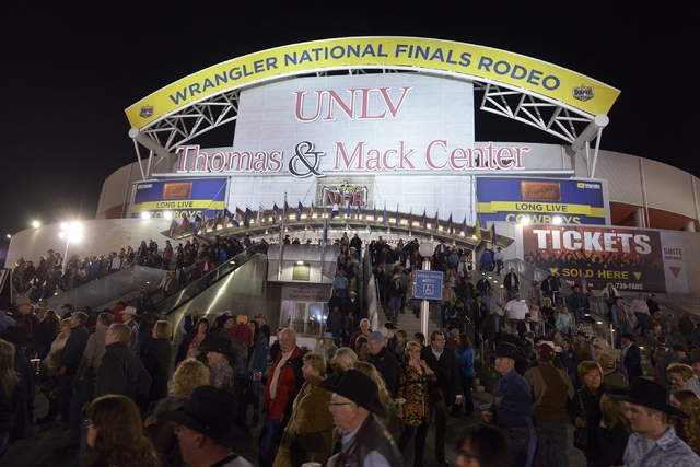 Fans stream out of the Thomas & Mack Center on Dec. 3, 2015, after the first night of the Wrangler National Finals Rodeo. “It’s been said this is the hardest ticket in sports,” PRCA comm ...