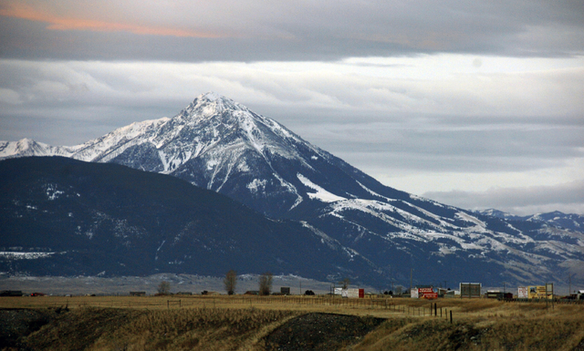 This Nov. 21, 2016 photo shows Emigrant Peak towering over the Paradise Valley in Montana north of Yellowstone National Park. U.S. officials on Monday, Nov.21, 2016 announced a ban on new mining c ...