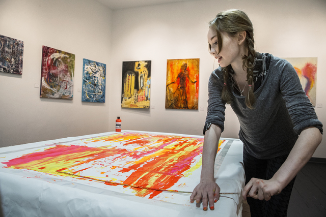 Artist Autumn de Forest works on a painting at the Gallery of Music & Art on Monday, Nov. 7, 2016, in Las Vegas.  Benjamin Hager/Las Vegas Review-Journal