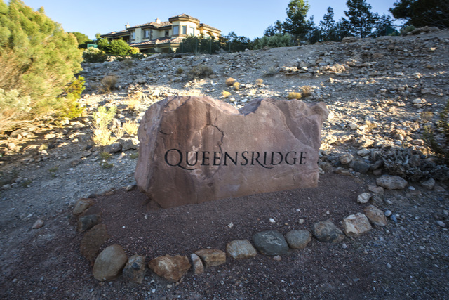 A marker identifies Queensridge community at Badlands Golf Course on Wednesday, Oct. 9, 2016. Residents are concerned they will loose their views if the controversial, high-density development is  ...