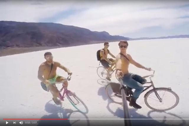 A screenshot from a YouTube video appears to show members of the Canadian adventure travel group High On Life riding bicycles on the salt flat at Badwater Basin in Death Valley, where wilderness r ...