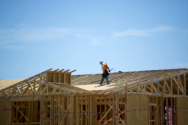 Crews work at a home construction site near Buffalo Drive and Sunset Road in southwest Las Vegas on Monday, July 18, 2016.  Daniel Clark/Las Vegas Review-Journal Follow @DanJClarkPhoto