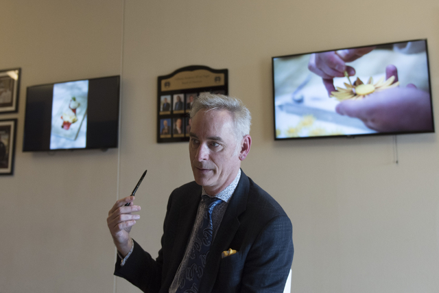Timothy S. Harlan, executive director with the Goldring Center for Culinary Medicine at Tulane University, speaks with a reporter during a cooking class for the Primary Care Cardiometabolic Risk S ...