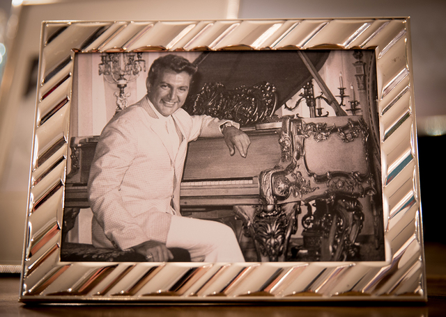 The mansion displays photos of Liberace in his younger years. (Tonya Harvey/Real Estate Millions)