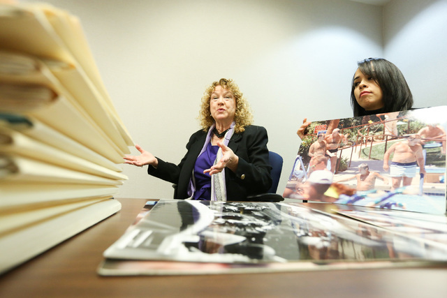 Lynn Goya, Clark County Clerk, left, and senior office specialist Rocio Leon show of some of the records that are being digitized at the Clark County Government Center in Las Vegas on Tuesday, Nov ...
