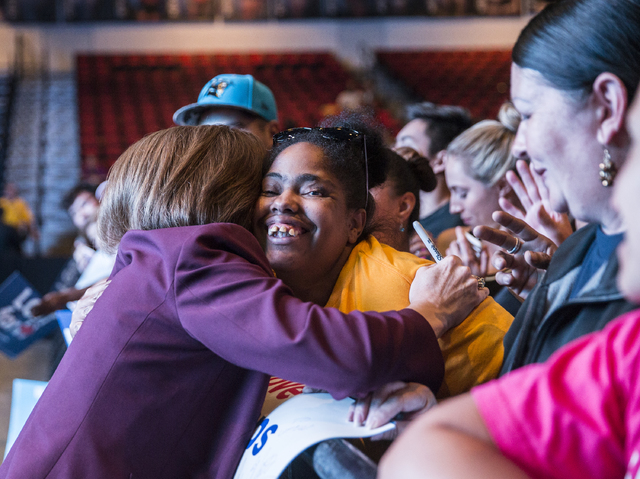 U.S. Senate candidate Catherine Cortez Masto, left, gets a hug from Teaera Garner at a rally for Democratic presidential nominee Hillary Clinton at Cox Pavilion on Thursday, Nov. 3, 2016, at UNLV, ...