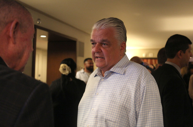 Clark County Commissioner Steve Sisolak speaks with a guest inside a suite at Aria Hotel-Casino in Las Vegas, Tuesday, Nov. 8, 2016. Elizabeth Brumley/Las Vegas Review-Journal Follow @elipagephoto