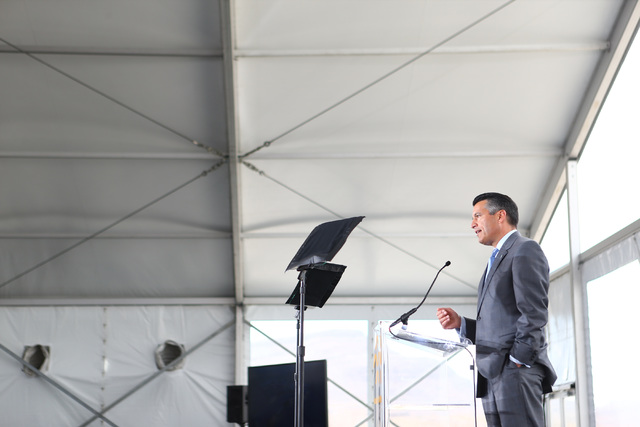 Gov. Brian Sandoval speaks during the groundbreaking for Faraday Future's planned 900-acre manufacturing site in North Las Vegas on Wednesday, April 13, 2016. Chase Stevens/Las Vegas Review-Journa ...