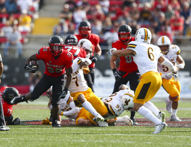UNLV running back Xzaviar Campbell (35) runs the ball during a football game against Wyoming at Sam Boyd Stadium in Las Vegas on Saturday, Nov. 12, 2016. (Chase Stevens/Las Vegas Review-Journal) F ...