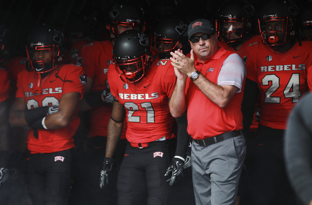UNLV head coach Tony Sanchez waits to enter the field with his team for a football game against Wyoming at Sam Boyd Stadium in Las Vegas on Saturday, Nov. 12, 2016. UNLV defeated Wyoming 69-66 in ...