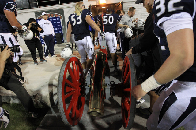 Nevada players take the Fremont Cannon to their locker room after defeating UNLV during their game Saturday, Nov. 29, 2014 at Sam Boyd Stadium. Nevada won 49-27. (Sam Morris/Las Vegas Review-Journal)