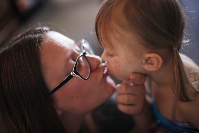 Acacia Hathaway kisses her daughter Ella at their home on Friday, Nov. 4, 2016, in Tonopah, Nevada. Rachel Aston/Las Vegas Review-Journal Follow @rookie__rae