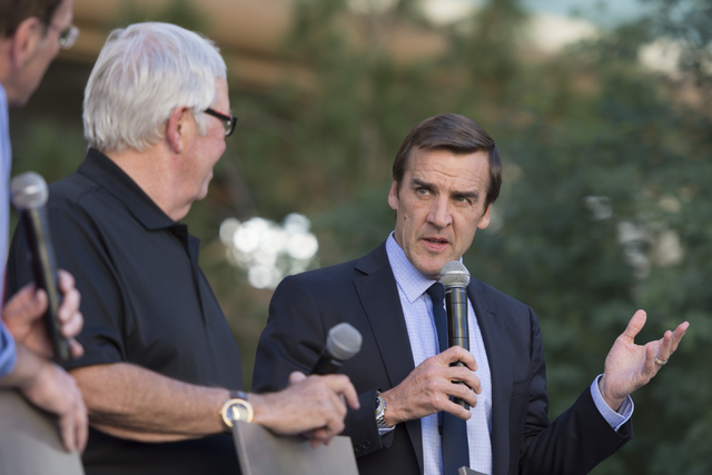 Las Vegas NHL franchise General Manager George McPhee, right, and owner Bill Foley talk on stage during Vegas Hockey Fan Fest at Toshiba Plaza in Las Vegas, Saturday, Oct. 8, 2016. (Jason Ogulnik/ ...
