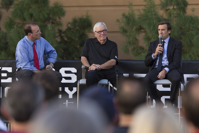 Las Vegas NHL franchise owner Bill Foley, center, and general manager George McPhee, right, do a Q & A session during the Vegas Hockey Fan Fest at Toshiba Plaza in Las Vegas, Saturday, Oct. 8, ...
