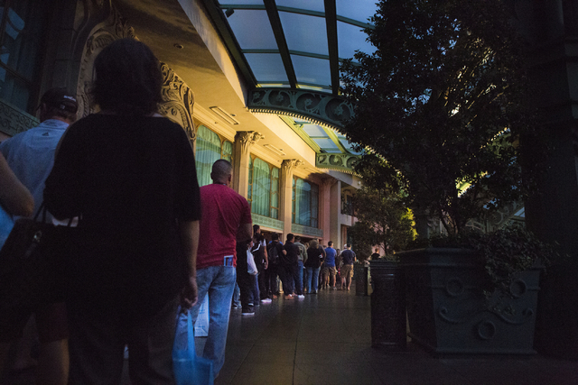 Guests of the Paris hotel-casino wait in line to be escorted to retrieve their belongings from their rooms, Thursday evening, Las Vegas, Nov. 3, 2016, after the power outage.   Elizabeth Page Brum ...