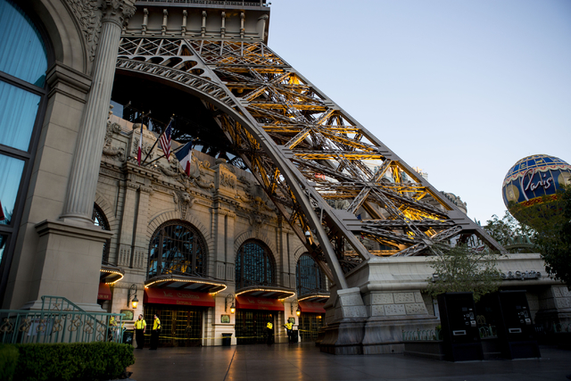 The exterior of the Paris hotel-casino in Las Vegas are lit up