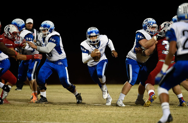 Basic quarterback Aaron McAllister finds a hole against Liberty during a high school football game at Liberty High School Friday, Nov. 18, 2016, in Henderson. David Becker/Las Vegas Review-Journal ...