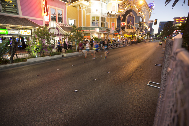 Runners compete in the annual Rock ‘n’ Roll Marathon at the Strip near The Mirage hotel-casino on Sunday, Nov. 13, 2016, in Las Vegas. Erik Verduzco/Las Vegas Review-Journal Follow @ ...