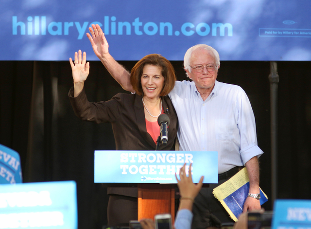 Nevada U.S. Senate Democratic candidate Catherine Cortez Masto, left, and Vermont Sen. Bernie Sanders wave a rally at College of Southern Nevada, Sunday, Nov. 6, 2016, in North Las Vegas. Some 700 ...