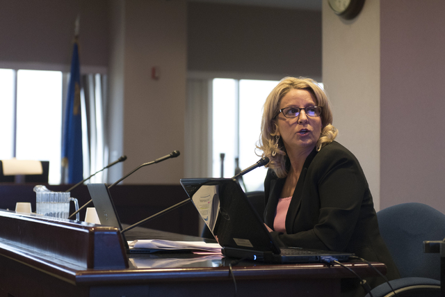 Dena Durish, deputy superintendent for educator effectiveness and family engagement with Nevada's Department of Education, speaks to committee members tasked with reorganizing Clark County School  ...