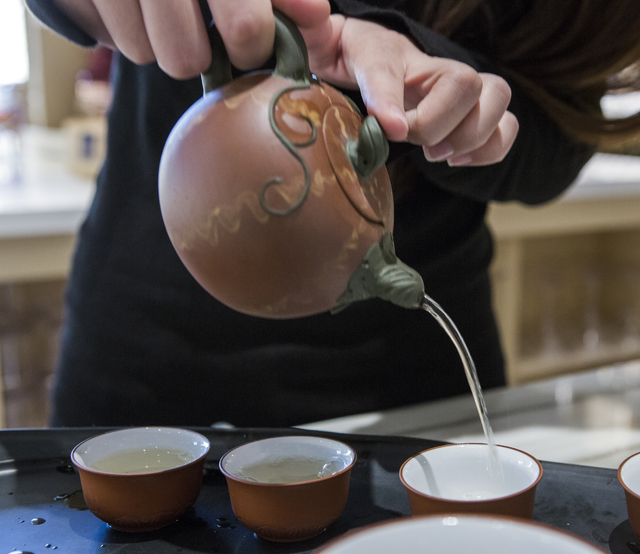 Tea sommelier Lola Zhao makes Quinba tea at Cha Garden in the Lucky Dragon on Friday, Nov. 18, 2016. (Jeff Scheid/Las Vegas Review-Journal Follow @jeffscheid)