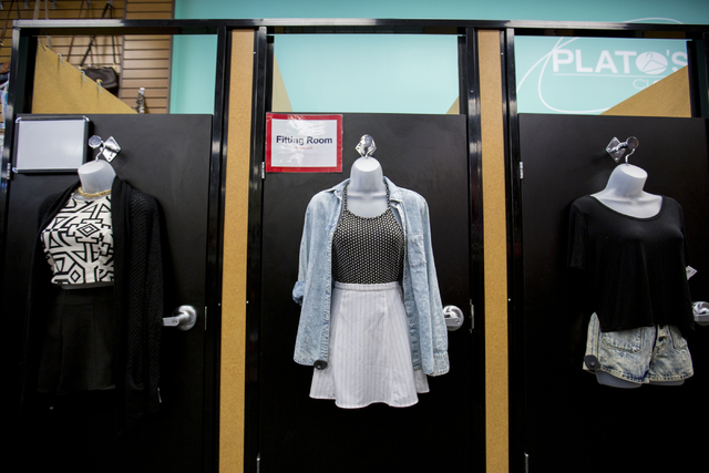 Outfits hang on the fitting rooms at Plato's Closet in Centennial Center, Friday, Sept. 30, 2016, in Las Vegas. Elizabeth Page Brumley/Las Vegas Review-Journal Follow @ELIPAGEPHOTO