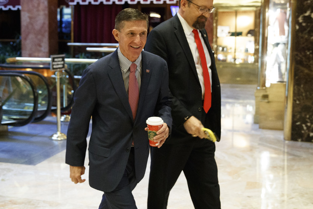 Retired Gen. Mike Flynn, a senior adviser to President-elect Donald Trump, arrives at Trump Tower, Monday, Nov. 14, 2016, in New York. (AP Photo/ Evan Vucci)