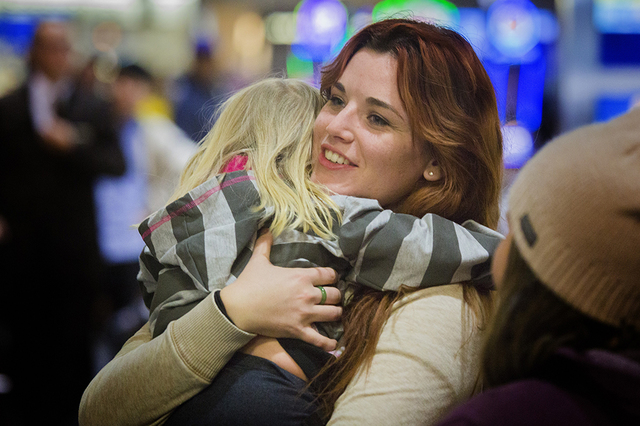 Shauna Mellor,right, hugs her niece Ember Gates after arriving at McCarran International Airport on Wednesday, Nov. 25, 2015. (Jeff Scheid/ Las Vegas Review-Journal) Follow @jlscheid