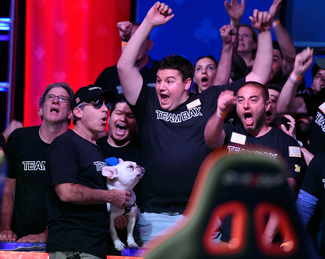 Cliff Josephy of N.Y. celebrates a winning hand with his supporters during the final table at the 2016 World Series of Poker Main Event at the Rio hotel-casino, Tuesday, Nov. 1, 2016, in Las Vegas ...