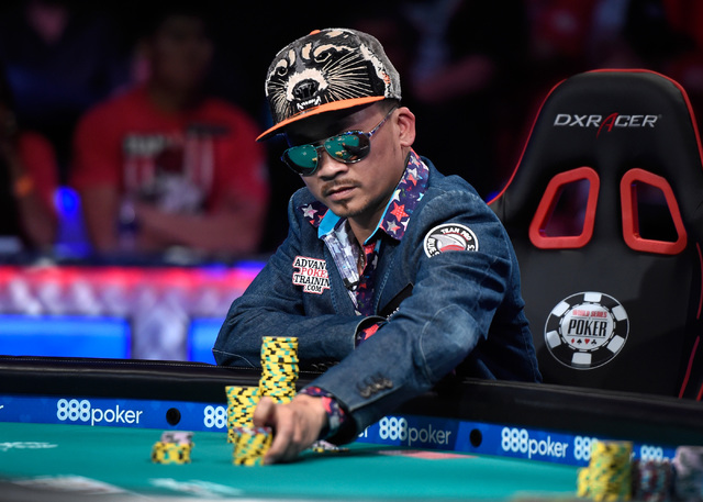 Qui Nguyen of Las Vegas places a bet during the final table at the 2016 World Series of Poker Main Event at the Rio hotel-casino, Tuesday, Nov. 1, 2016, in Las Vegas. David Becker/Las Vegas Review ...